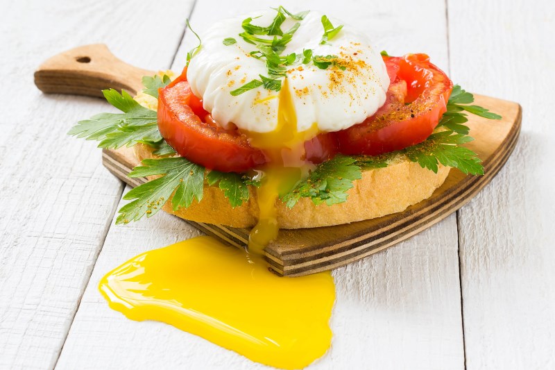 Poached Eggs and Fried Tomatoes breakfast