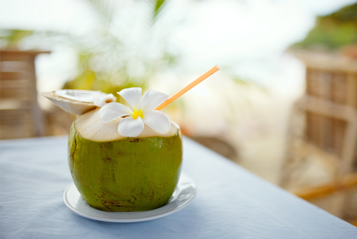 coconut-drink-straw-table