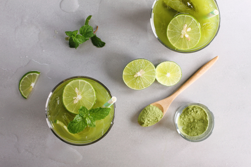 iced green tea with lime and fresh mint, top view