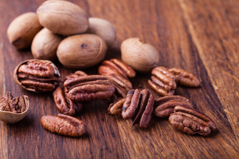 Pecan nuts on a wooden table