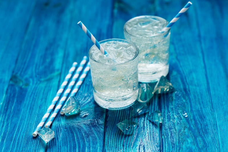 two glasses of water on a table